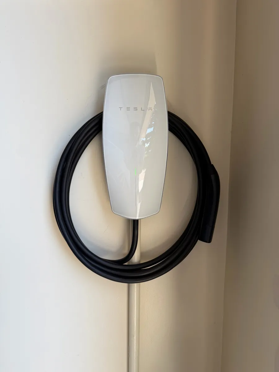 Close-up of a newly installed Tesla Wall Connector